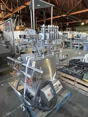 USED INLINE FILLING SYSTEMS 6 HEAD RINSER