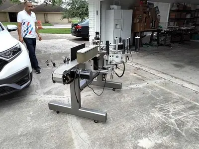 Quadrel model Moduline wraparound pressure sensitive labeler