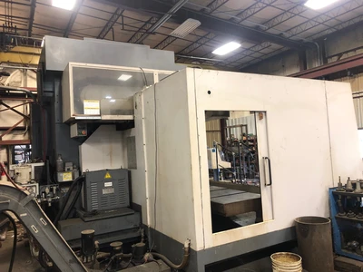 USED OKUMA MILLAC 1052V