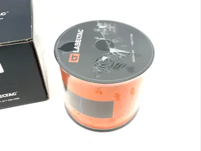 USED LABELTAC PRO MODEL HIGH PERF. 10 YEAR VINYL LABEL, ORANGE 4" X 150'/ROLL