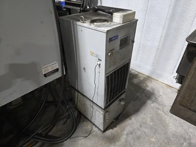 Hyundai HI-V50D VMC w/ 30-Slot ATC, Conveyor, (2) Kurt Vise, Fanuc Oi-MC Controller