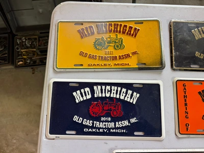 (8) Assorted license plates