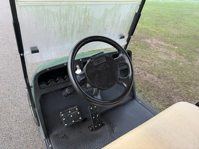 (1) 2015 E-Z-Go golf cart with a Kawasaki gas engine, includes canopy, ball cover, club cover, fold-...