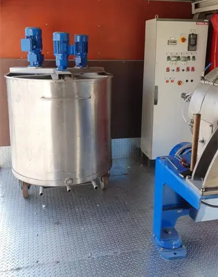 Pieralisi FP 600 RS decanter centrifuge in container.