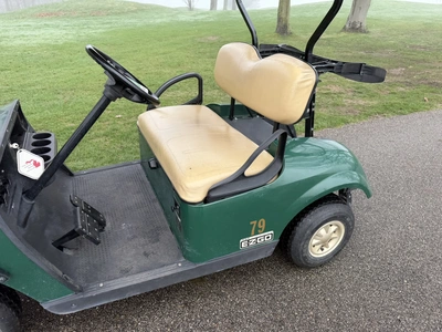 (1) 2014 E-Z-Go golf cart with a Kawasaki gas engine, does not include Club canopy, ball carrier, fo...