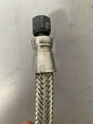 USED 35" STAINLESS STEEL BRAIDED HOSE W/ 5/8" SWAGELOK 316 3100 PSIG CONNECTION
