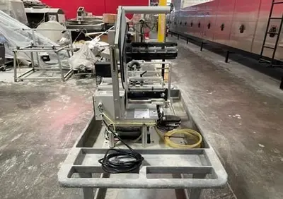 USED UNIVERSAL LABELING SYSTEMS R-310