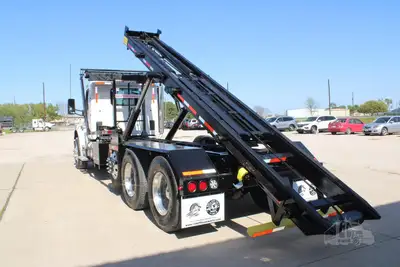 New | in-Stock 2027 PETERBILT 548 Rolloff Trucks Texas US | Roll Off Truck World #1492012