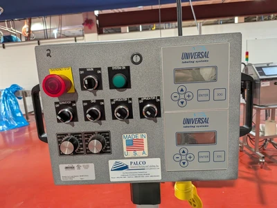 Universal Top and Bottom Label Applicator with Top-and-Bottom Transport Conveyor