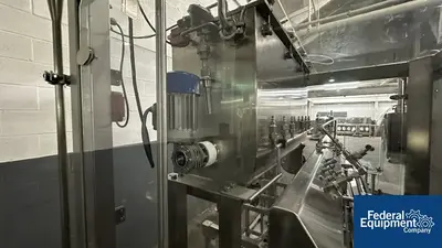 USED Capmatic Capmatic Bottle Filling Line