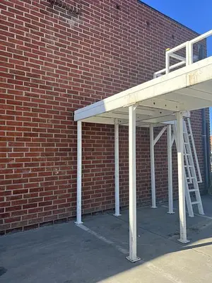 USED HEAVY DUTY CORNER MEZZANINE / MACHINE PLATFORM  154" X  117" X  136"