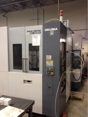 USED 2006 OKUMA SPACE