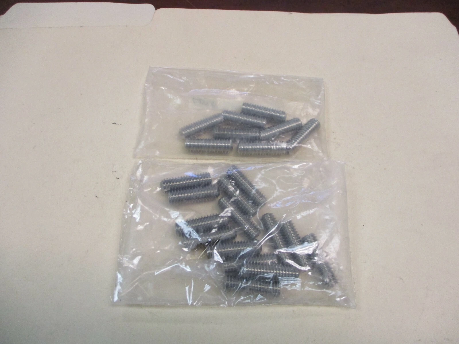 Unused Stainless Steel 1" Cup Point Set Socket Screws (QTY 22)