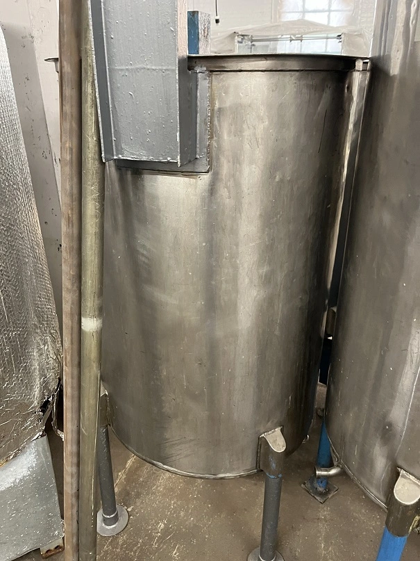 Used approximately 120 gallon stainless steel vertical tank