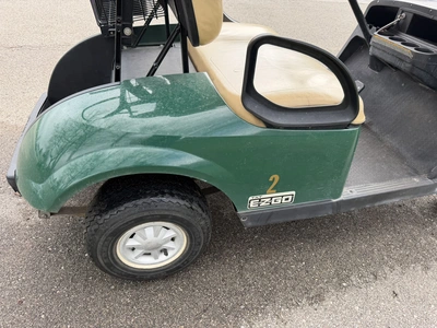 (1) 2015 E-Z-Go golf cart with a Kawasaki gas engine, includes Club canopy and ball washer, fold-dow...