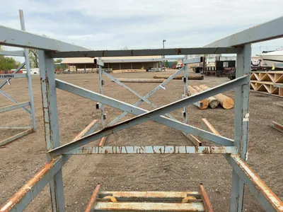 Metal Two Sided Cantilever Rack, on wheels so it can roll sideways, welded together, arms stick out ...