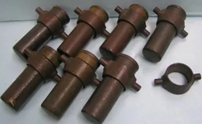QTY. 7. BRASS CENTRIFUGE CUPS 1 3/16 INCH WIDE X 3...