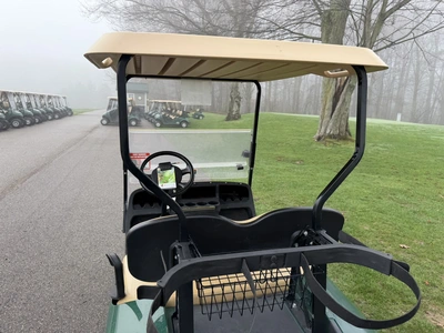(1) 2014 E-Z-Go golf cart with a Kawasaki gas engine, includes canopy, ball carrier, fold-down winds...