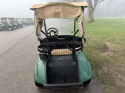 (1) 2015 E-Z-Go golf cart with a Kawasaki gas engine, includes canopy, ball cover, club cover, fold-...