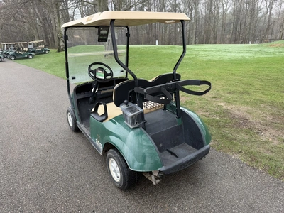 (1) 2015 E-Z-Go golf cart with a Kawasaki gas engine, does not include Club canopy, includes ball wa...