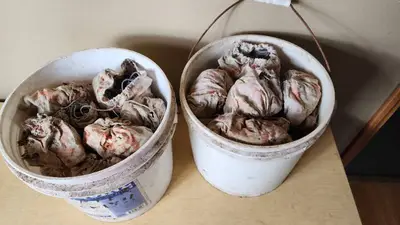 Buckets of Used Cast Iron Pipe Clamps with Bags