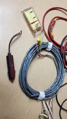 Mixed Electrical Components and Accessories including Various Cables, Connectors, and Switches