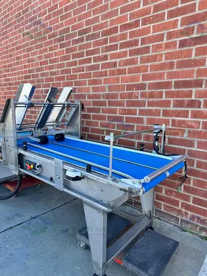 USED REDEMAC STAINLESS STEEL DUAL CONVEYOR PACKAGING MACHINE W/ OPTEL PHARMAPROOF