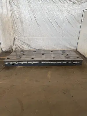 59" WIDE X 138" LONG X 12" TALL T-SLOTTED FLOOR PLATE. STOCK #0543426