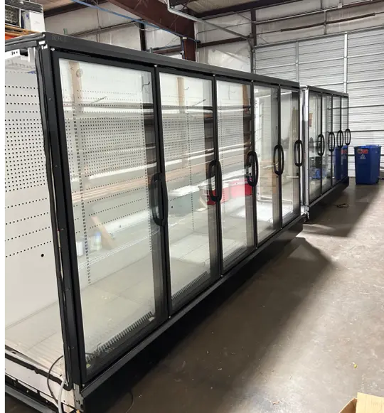 129-0118 Run of 36 Hussmann Hybrid Freezer and Cooler Doors. 2023