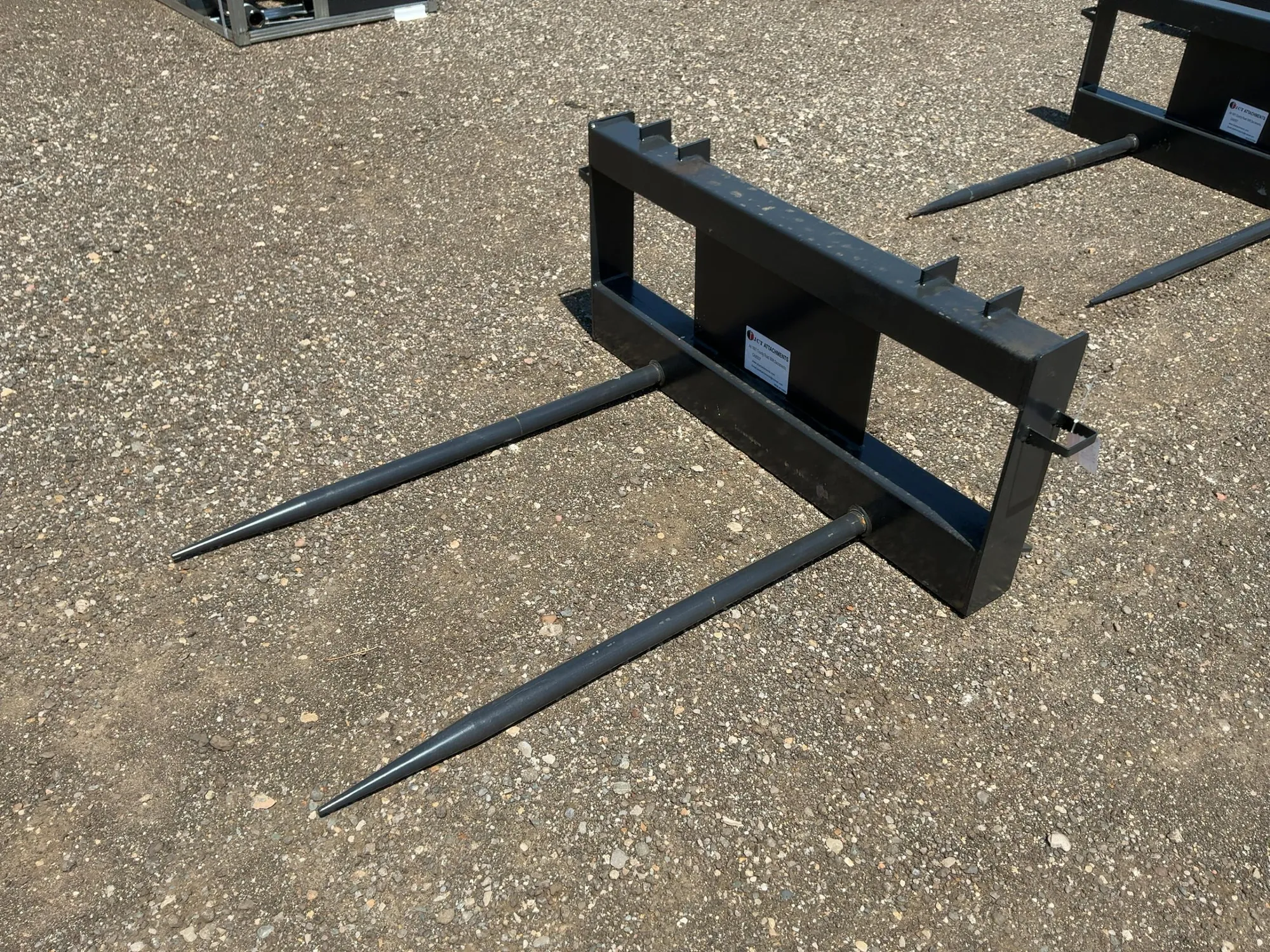 New JCT Bale Spear Skid Steer Attachment, Universal Quick Attach, Has Two Spears that Stick Out Appr...