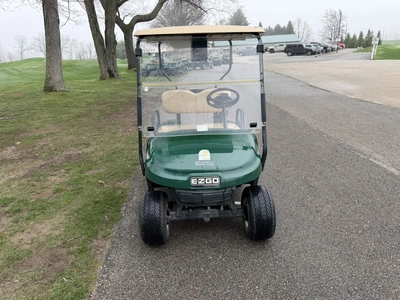 (1) 2015 E-Z-Go golf cart with a Kawasaki gas engine, does not include Club canopy, includes ball wa...