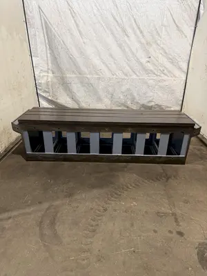 25" WIDE X 89" LONG X 24.5" TALL T-SLOTTED TABLE. STOCK # 0778825