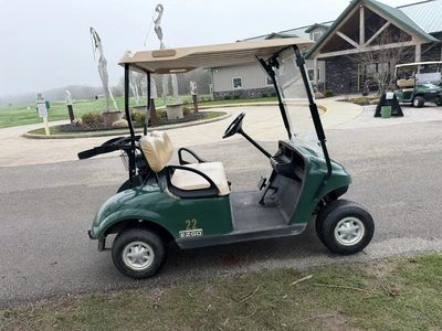 (1) 2015 E-Z-Go golf cart with a Kawasaki gas engine, does not include Club canopy, includes ball wa...