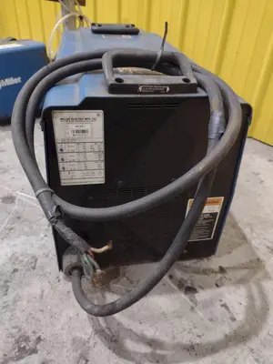 MILLER XMT450 CC CV WELDER & S74 MPA PLUS FEEDER: STOCK #23484