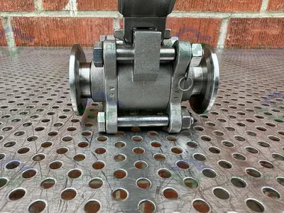 USED INLINE INDUSTRIES STAINLESS STEEL BALL VALVE W/ 1" SANITARY FITTING