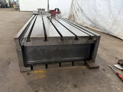 28" WIDE x 83" LONG x 12" TALL T-SLOTTED MACHINE RISER TABLE. STOCK # 0433926