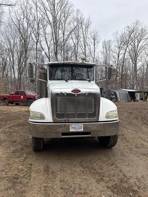 USED 2007 PETERBILT 335 PETERBUILT TANDEM ROLLBACK