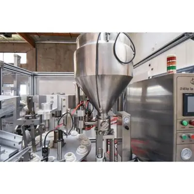 GF-400 Tube Filler/Sealer, rated 30-70 per minute