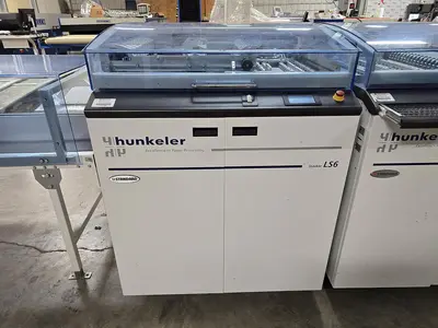 USED 2015 HUNKELER ROLL TO SHEET 22” WIDE CONVERSION LINE