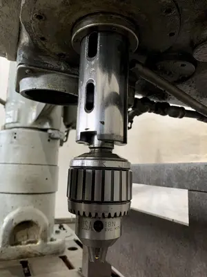 4' X 11" CARLTON 1A RADIAL ARM DRILL. STOCK # 0850023.