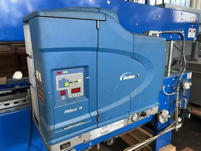 USED ELLIOTT MODEL 74 IMPACT CASE AUTOMATIC CASE SEALER