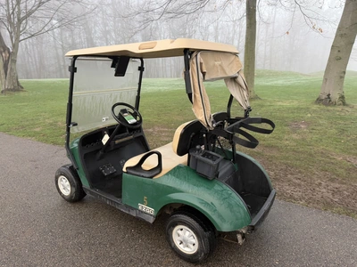 (1) 2015 E-Z-Go golf cart with a Kawasaki gas engine, includes canopy, ball cover, club cover, fold-...