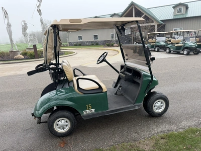 (1) 2015 E-Z-Go golf cart with a Kawasaki gas engine, includes Club canopy, ball washer, fold-down w...