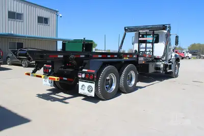 New | in-Stock 2025 MACK GRANITE 64BR Rolloff Trucks Texas US | Roll Off Truck World #1491900