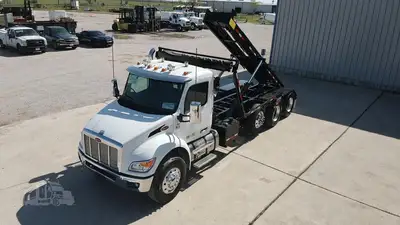 New | in-Stock 2027 PETERBILT 548 Rolloff Trucks Texas US | Roll Off Truck World #1492012