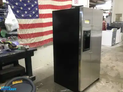 USED GE STAINLESS STEEL AND BLACK SIDE X SIDE REFRIGERATOR HEAVY DUTY ENERGY STAR