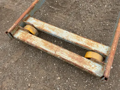 Metal Two Sided Cantilever Rack, on wheels so it can roll sideways, welded together, arms stick out ...
