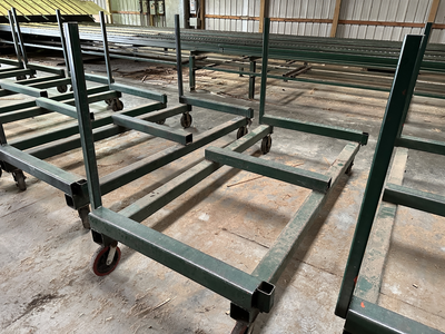 6 strand, 120' green chain with incoming deck and hoist. 24 heavy duty carts