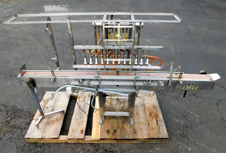 Used FILLING EQUIPMENT CO. 12 HEAD Overflow Pressure Gravity Liquid Fillers New Jersey US | Champion Trading Corporation #423623