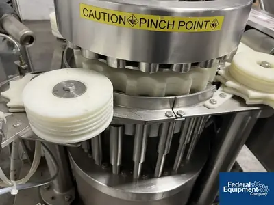 Unknown Rotary Capper, with Conveyor